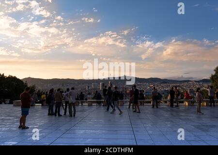 Tourists walking in front of the National Art Museum of Catalonia entrance. Stock Photo