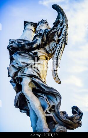 Italy, Rome, Castel Sant'Angelo, statue of an angel with a column Stock Photo
