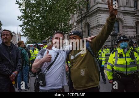 Traflagar Square, London, 29th August 2020. People protest lockdown rules agaist the goverment, bill gates and vaccines. David Icke Stock Photo