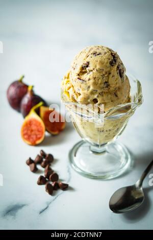 Chocolate Fig Ice Cream in a Glass Dish Stock Photo