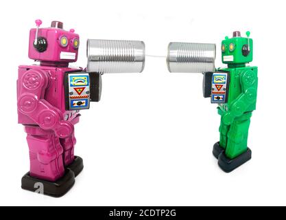 two  robots on tin phones Stock Photo