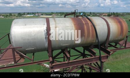 The water tower. An old rustic communal communication. The water tower Stock Photo