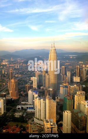 The Petronas Twin Towers in the first evening light Stock Photo
