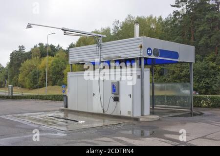 An empty no name standard self-service car wash is located next to the highway Stock Photo