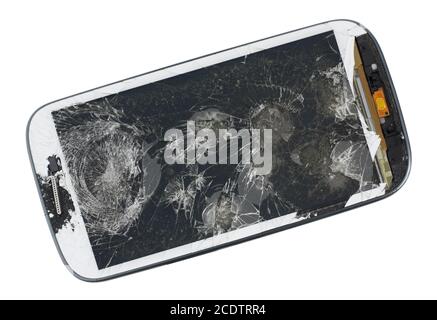 A broken screen of modern  phone. This device was wiped from a pneumatic gun. Stock Photo