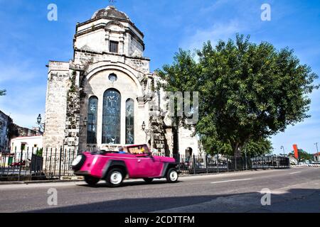 ink American Classic Car in front of  the Church Iglesia de San Francisco de Paula Stock Photo