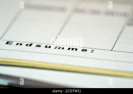 File folder on a desk in the office with the lettering Sum total Stock Photo