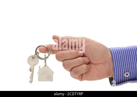 house key on ring in hand of real estate agent Stock Photo