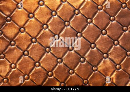 copper plate designed with square patterns Stock Photo