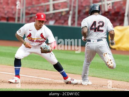 St. Louis, USA. 29th August, 2020. Cleveland Indians Delino Deshields is out at first base on a sacrifice bunt attempt as Kolten Wong touches first base at the same time in the 12th inning at Busch Stadium in St. Louis on Saturday, August 29, 2020.Photo by Bill Greenblatt/UPI Stock Photo