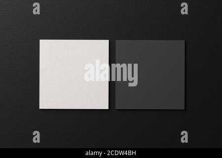 White square shape paper business card mockup on black modern fabric table background. Branding presentation template print graphic design. Two cards Stock Photo