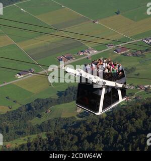 The first cable car of the world with a roofless upper deck. Stanserhorn cable car, Switzerland. Stock Photo