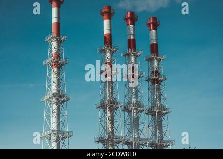 Industrial zone,The equipment of oil refining,Close-up of industrial pipelines of an oil-refinery plant Stock Photo