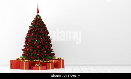 decorated christmas tree with gift boxes in white room Stock Photo