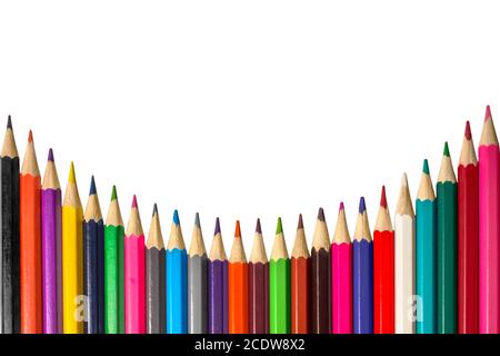 Colored pencils laid out in a row on white background Stock Photo