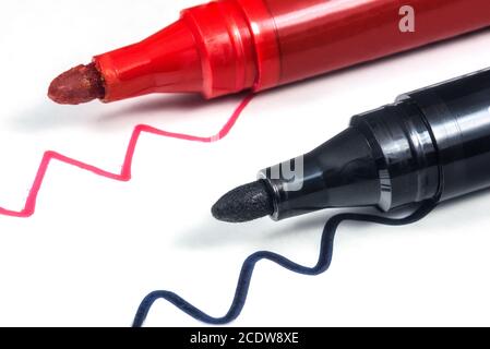 Black and red markers on a white background isolated Stock Photo