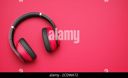 pink and black wireless headphones isolated on pink background Stock Photo