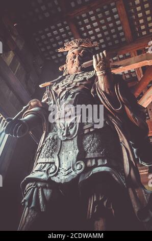 Komokuten statue in Daibutsu-den Todai-ji temple, Nara, Japan Stock Photo