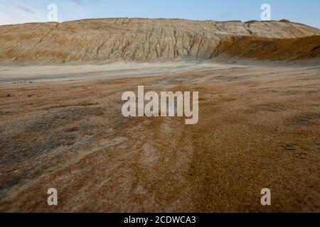 Dirty and polluted soil on territory with dangerous environmental situation Stock Photo