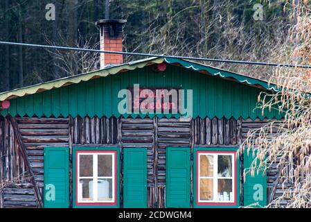 Wooden house in the middle of the forest Stock Photo