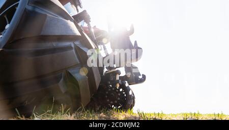 Close-up view of modern agricultural implements including plow ...