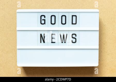 Lightbox with word good news on wood background Stock Photo