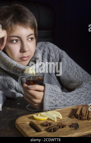 Young woman with hot drink Stock Photo