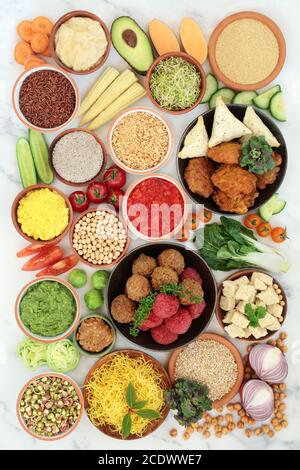 Vegan super food for a healthy planet with foods high in antioxidants, protein, omega 3, dietary fibre, anthocyanins, smart carbs, vitamins & minerals Stock Photo