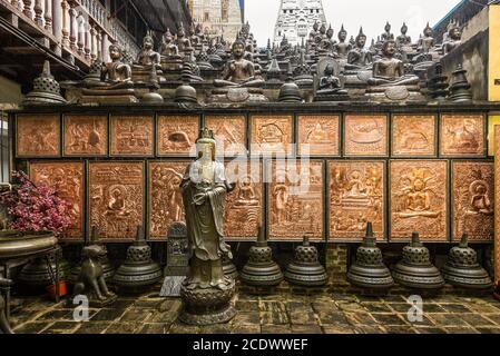 Colombo, Sri Lanka - November 25, 2019: Buddhist temple exhibits in rainy weather at the Gangaramaya Temple in Colombo, Sri Lanka. Stock Photo