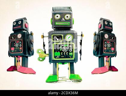 three black robot toys on white Stock Photo