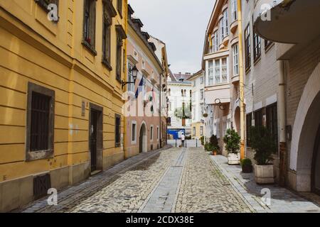 Colorful houses on a street in the medieval historical Old town of Sopron city, Hungary Stock Photo