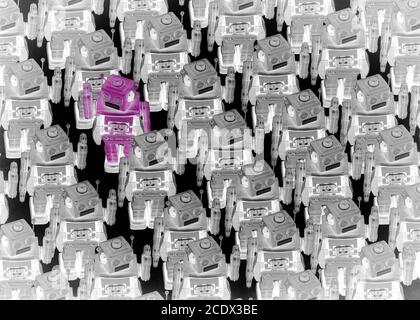 concept gong against the crowed with retro robot toys Stock Photo