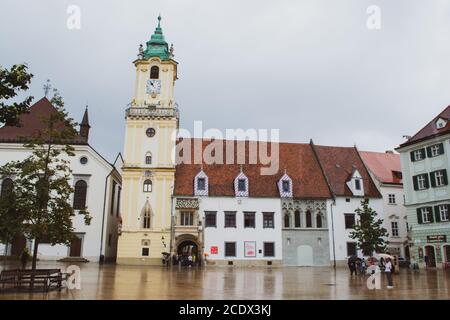 BRATISLAVA, SLOVAKIA - Main Square (Hlavne namestie) and view of old Town Hall in Bratislava city. The square is located in the Old Town and it is the Stock Photo