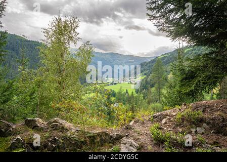 Sun breaks through the clouds over valley "Thomatal" in state Salzburgerland, Austria Stock Photo