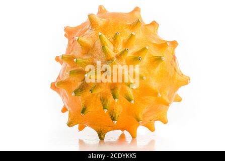 Kiwano or Horned Melon Cucumis metuliferus detailed skin shoot on white background isolated Stock Photo
