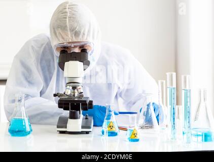 scientist use microscope Stock Photo