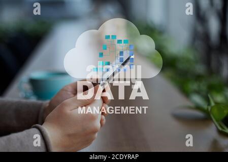 Data Management Concept. Collage With Woman Using Smartphone And Information Storage Cloud Stock Photo