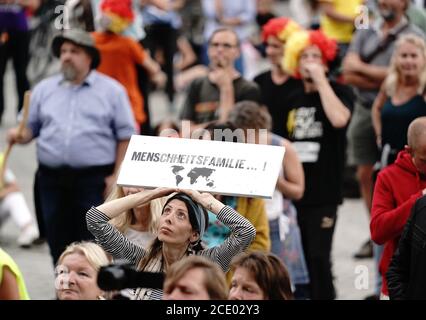 Berlin, Germany. 30th Aug, 2020. Participants demonstrate against the corona measures of the German government in front of the Brandenburg Gate. Credit: Kay Nietfeld/dpa/Alamy Live News Stock Photo