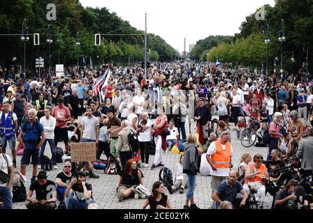 Berlin, Germany. 30th Aug, 2020. Participants demonstrate against the corona measures of the German government in front of the Brandenburg Gate. Credit: Kay Nietfeld/dpa/Alamy Live News Stock Photo