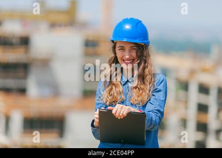 young woman engineer working in construction site Stock Photo