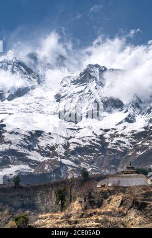 The view on Dhaulagiri peak and buddhist monastery Stock Photo