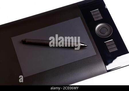 Small size pen tablet with stilus isolated on white. Stock Photo