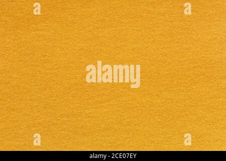 Grainy paper texture light orange background. High quality texture. Stock Photo