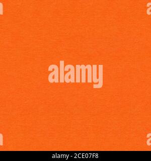 Light orange paper wall texture. Seamless square background, tile ready. Stock Photo