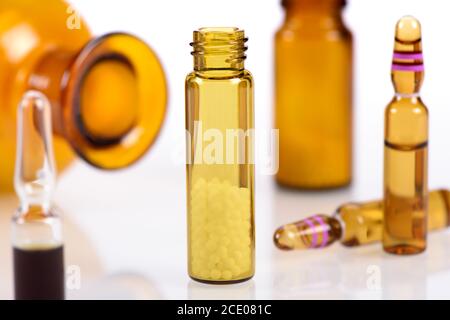 herbal and homeopathic pills in medicinal flask Stock Photo