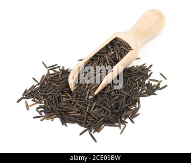 Wild black rice in wooden spoon isolated on white background Stock Photo