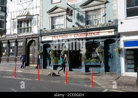 Windsor, Berkshire, UK. 30th August, 2020. New pedestrian social distancing measures have temporarily widened the pavement out the Duchess of Cambridge pub in Windsor. Credit: Maureen McLean/Alamy Stock Photo