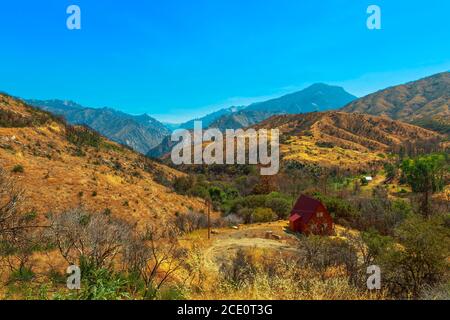 House in Kings river Canyon scenic byway Highway 180 in Kings Canyon National Park, California, United States of America. One of deepest canyons in Stock Photo