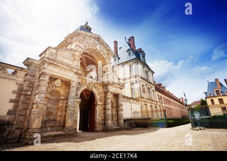 Gate to garden in French king royal Fontainebleau palace, France Stock Photo