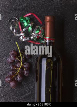 Bottle of wine with grapes Stock Photo
